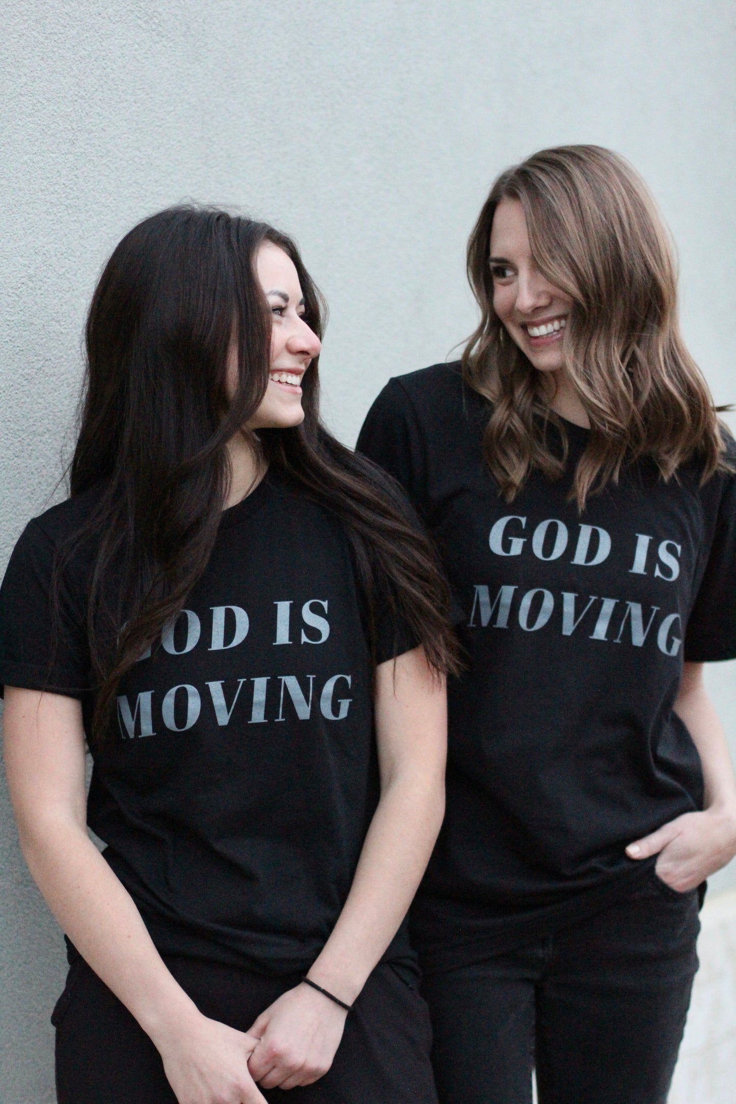 God is moving | black unisex tee