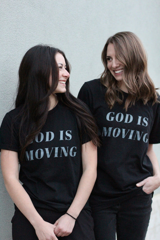God is moving | black unisex tee